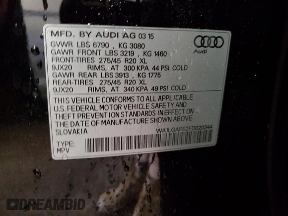 2015 Audi Q7 Premium Plus with VIN WA1LGAFE2FD020344, listed as a Copart auction lot 59184115 with 143,389 mi miles and Salvage title. Bid and sale history available at DreamBid. Image 13.