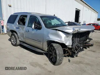 2011 GMC Yukon Denali with VIN 1GKS2EEF5BR338669, listed as a Copart auction lot 76604324 with 156,641 mi miles and Salvage Title. Bid and sale history available at carsss.com. Image 4.
