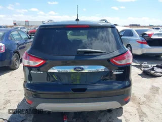 2015 Ford Escape Titanium with VIN 1FMCU0JX3FUB39808, listed as a IAAI auction lot 42212271 with 136,488 mi miles and . Bid and sale history available at DreamBid. Image 17.