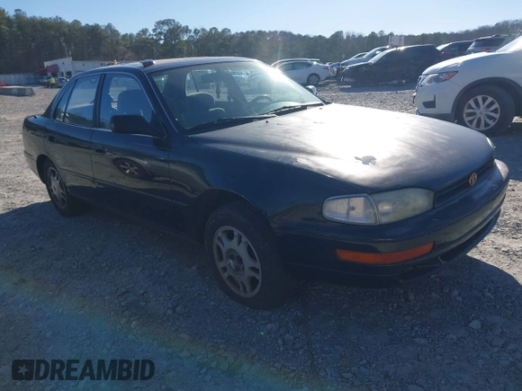 1994 Toyota Camry XLE with VIN JT2GK13E9R0025099, listed as a IAAI auction lot 41735273 with 281,833 mi miles. Bid and sale history available at carsss.com. Image 1.