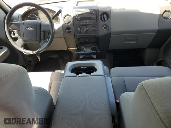 2007 Ford F-150 STX with VIN 1FTRX12W87FB51282, listed as a Copart auction lot 55580365 with 213,923 mi miles and Salvage title. Bid and sale history available at DreamBid. Image 8.