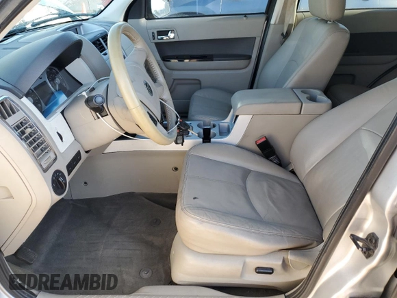 2011 Mercury Mariner Premier with VIN 4M2CN9HG4BKJ08207, listed as a Copart auction lot 54797505 with 227,898 mi miles and Salvage title. Bid and sale history available at DreamBid. Image 7.