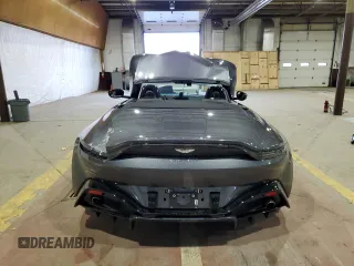 2021 Aston Martin Vantage z VIN SCFSMGBW2MGP05338, wystawiony jako Copart lot #80123274 z przebiegiem Nie podano mil oraz Szkody całkowita. Historia ofert i sprzedaży dostępna na DreamBid. Obrazek 6.