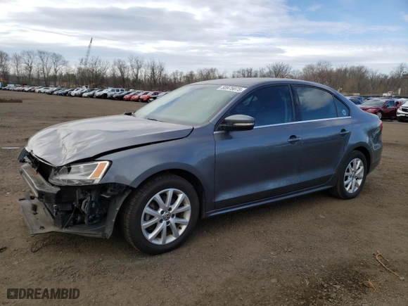 2014 Volkswagen Jetta Sedan SE w/Connectivity with VIN 3VWD17AJ1EM328186, listed as a Copart auction lot 50975075 with 96,129 mi miles and Salvage Title. Bid and sale history available at carsss.com. Image 1.