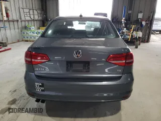2015 Volkswagen Jetta SE с VIN 3VWD17AJ4FM325204, выставлен на аукционе Copart как лот 59141575 с пробегом Не указан миль и Списание • Salvage title. История ставок и продаж доступна на DreamBid. Изображение 6.