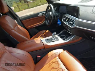 2019 BMW X7 xDrive40i z VIN 5UXCW2C5XKL084486, wystawiony jako IAAI lot #42230283 z przebiegiem 78 975 mil mil oraz . Historia ofert i sprzedaży dostępna na DreamBid. Obrazek 5.