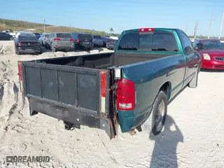 2004 Dodge Ram 1500 ST with VIN 1D7HA16K64J112158, listed as a IAAI auction lot 41905576 with 166,918 mi miles. Bid and sale history available at carsss.com. Image 4.