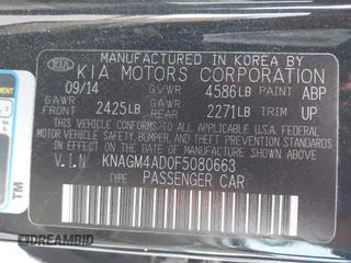 2015 Kia Optima with VIN KNAGM4AD0F5080663, listed as a IAAI auction lot 42083880 with 119,661 mi miles and . Bid and sale history available at carsss.com. Image 9.