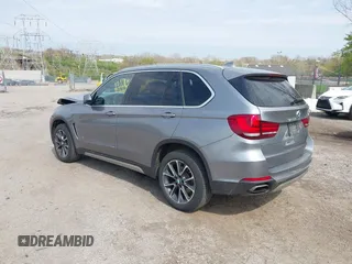 2018 BMW X5 xDrive35i with VIN 5UXKR0C51J0X95114, listed as a IAAI auction lot 42037253 with 80,095 mi miles. Bid and sale history available at carsss.com. Image 3.