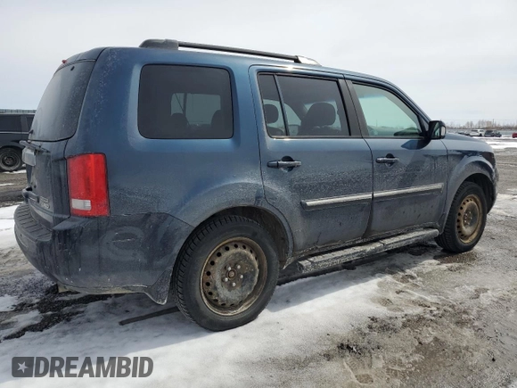 2010 Honda Pilot Touring with VIN 5FNYF4H99AB501127, listed as a Copart auction lot 52602285 with 271,602 mi miles and Salvage Title. Bid and sale history available at carsss.com. Image 3.