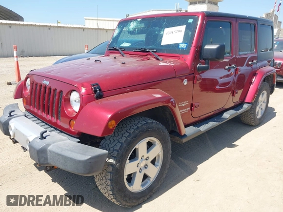 2012 Jeep Wrangler Unlimited Sahara with VIN 1C4BJWEG2CL209600, listed as a IAAI auction lot 42015290 with 133,229 mi miles and . Bid and sale history available at DreamBid. Image 2.