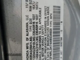 2010 Honda Odyssey EX-L z VIN 5FNRL3H74AB034608, wystawiony jako Copart lot #59262505 z przebiegiem 243 186 mil mil oraz Szkoda całkowita • Salvage title. Historia ofert i sprzedaży dostępna na DreamBid. Obrazek 13.
