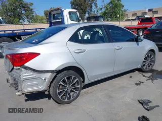 2017 Toyota Corolla L z VIN 5YFBURHE6HP652091, wystawiony jako IAAI lot #42131898 z przebiegiem 380 284 mil mil oraz . Historia ofert i sprzedaży dostępna na DreamBid. Obrazek 4.