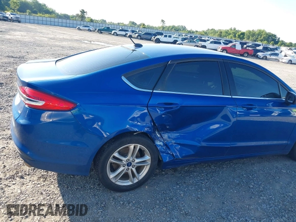 2018 Ford Fusion SE z VIN 3FA6P0H7XJR106776, wystawiony jako IAAI lot #42243361 z przebiegiem 174 000 mil mil oraz . Historia ofert i sprzedaży dostępna na DreamBid. Obrazek 6.