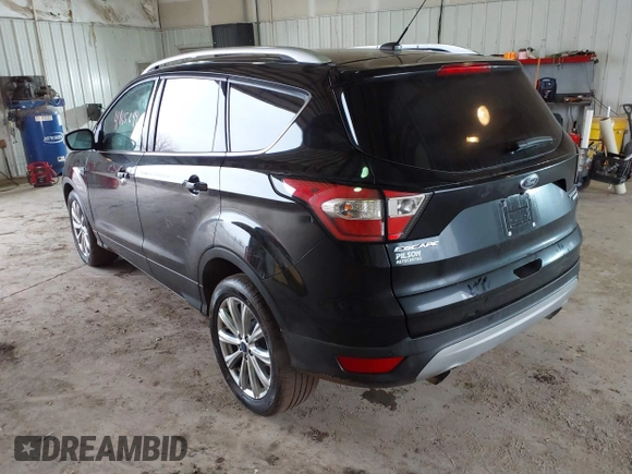 2017 Ford Escape Titanium with VIN 1FMCU0JD2HUE71179, listed as a IAAI auction lot 41465849 with 95,426 mi miles. Bid and sale history available at carsss.com. Image 3.