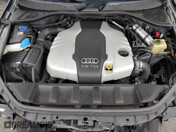 2014 Audi Q7 Premium Plus with VIN WA1LMAFE8ED015737, listed as a Copart auction lot 62099545 with 129,505 mi miles and Salvage title. Bid and sale history available at DreamBid. Image 12.