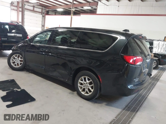 2017 Chrysler Pacifica Touring with VIN 2C4RC1DGXHR585294, listed as a IAAI auction lot 41971914 with 153,028 mi miles and . Bid and sale history available at DreamBid. Image 3.