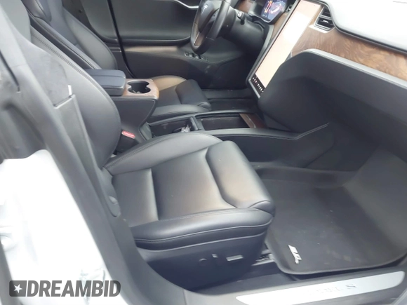 2020 Tesla Model S Long Range with VIN 5YJSA1E27LF370700, listed as a IAAI auction lot 41703463 with 26,024 mi miles and . Bid and sale history available at carsss.com. Image 5.