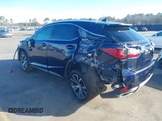 2022 Lexus RX with VIN 2T2HZMAA6NC228908, listed as a IAAI auction lot 41592778 with 46,966 mi miles. Bid and sale history available at carsss.com. Image 3.