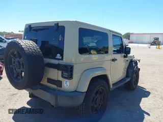 2011 Jeep Wrangler Sahara with VIN 1J4AA5D13BL562732, listed as a IAAI auction lot 41838520 with 148,359 mi miles and . Bid and sale history available at DreamBid. Image 4.