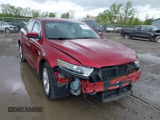 2018 Ford Taurus SEL z VIN 1FAHP2E85JG124997, wystawiony jako IAAI lot #42194985 z przebiegiem 86 456 mil mil oraz . Historia ofert i sprzedaży dostępna na DreamBid. Obrazek 1.