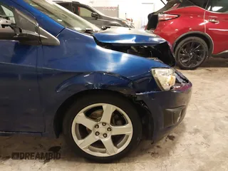 2012 Chevrolet Sonic LTZ z VIN 1G1JE5SB4C4214450, wystawiony jako IAAI lot #42207345 z przebiegiem 120 152 mil mil oraz . Historia ofert i sprzedaży dostępna na DreamBid. Obrazek 18.