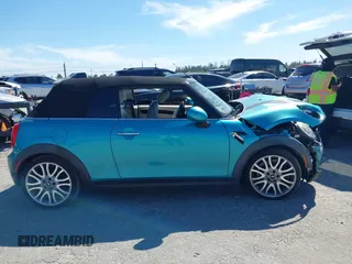 2016 MINI Convertible z VIN WMWWG5C5XG3A83276, wystawiony jako IAAI lot #41864830 z przebiegiem 103 721 mil mil oraz . Historia ofert i sprzedaży dostępna na DreamBid. Obrazek 13.