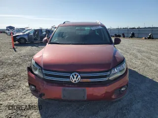 2013 Volkswagen Tiguan SE with VIN WVGBV7AX9DW012368, listed as a Copart auction lot 57244975 with 177,810 mi miles and Salvage title. Bid and sale history available at DreamBid. Image 5.