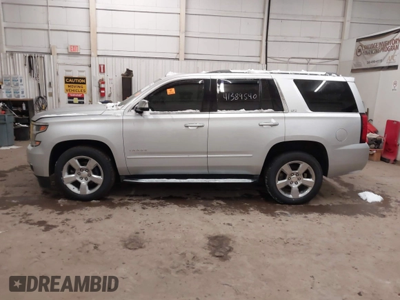 2016 Chevrolet Tahoe LTZ z VIN 1GNSKCKCXGR284827, wystawiony jako IAAI lot #41389540 z przebiegiem 93 150 mil mil oraz . Historia ofert i sprzedaży dostępna na DreamBid. Obrazek 14.