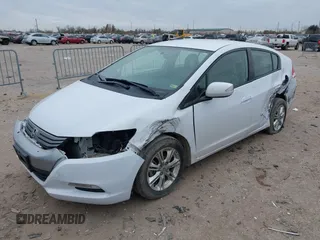 2010 Honda Insight EX with VIN JHMZE2H71AS035091, listed as a IAAI auction lot 41380128 with 181,653 mi miles and . Bid and sale history available at DreamBid. Image 18.