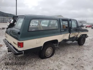 1990 GMC Suburban z VIN 1GKGR26K8LF528125, wystawiony jako Copart lot #84931724 z przebiegiem Nie podano mil oraz Szkody całkowita. Historia ofert i sprzedaży dostępna na DreamBid. Obrazek 3.