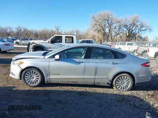 2015 Ford Fusion S Hybrid with VIN 3FA6P0UU7FR307568, listed as a IAAI auction lot 41421139 with 152,186 mi miles. Bid and sale history available at carsss.com. Image 15.