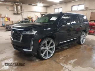 2021 Cadillac Escalade Luxury z VIN 1GYS4AKL7MR295510, wystawiony jako IAAI lot #38398966 z przebiegiem 26 228 mil mil oraz . Historia ofert i sprzedaży dostępna na DreamBid. Obrazek 17.