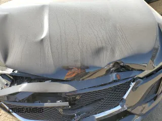 2023 Cadillac CT5 Sport z VIN 1G6DU5RK9P0135448, wystawiony jako Copart lot #70596274 z przebiegiem 9 159 mil mil oraz Szkoda całkowita • Salvage title. Historia ofert i sprzedaży dostępna na DreamBid. Obrazek 13.