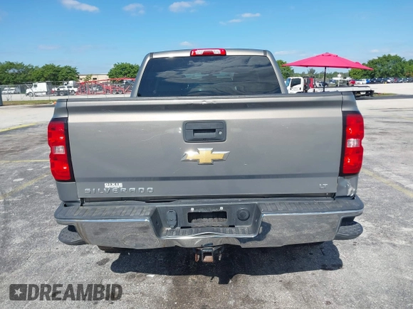 2017 Chevrolet Silverado 1500 LT with VIN 3GCPCREC1HG380406, listed as a IAAI auction lot 42031974 with 128,444 mi miles. Bid and sale history available at carsss.com. Image 16.