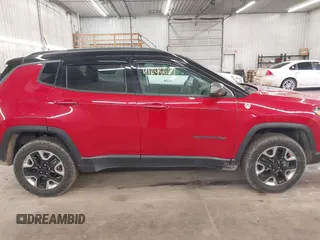 2018 Jeep Compass Trailhawk with VIN 3C4NJDDB7JT234551, listed as a IAAI auction lot 41695627 with 65,381 mi miles and . Bid and sale history available at carsss.com. Image 14.