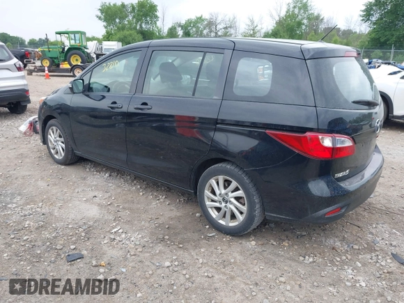 2015 Mazda 5 Sport with VIN JM1CW2BL2F0190990, listed as a IAAI auction lot 42532210 with 98,528 mi miles and . Bid and sale history available at DreamBid. Image 3.