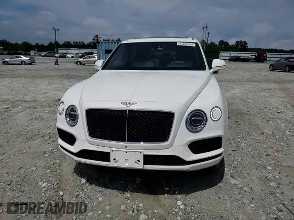 2019 Bentley Bentayga V8 z VIN SJAAM2ZV0KC026362, wystawiony jako Copart lot #54059393 z przebiegiem 31 530 mil mil oraz . Historia ofert i sprzedaży dostępna na DreamBid. Obrazek 11.