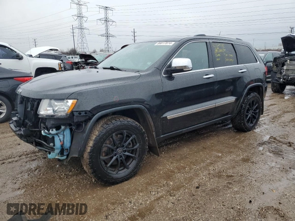2013 Jeep Grand Cherokee Overland with VIN 1C4RJFCT9DC615096, listed as a Copart auction lot 86817074 with 112,421 mi miles and Salvage Title. Bid and sale history available at carsss.com. Image 1.
