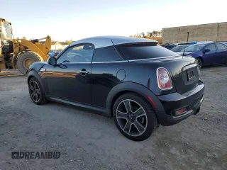 2013 MINI Coupe S z VIN WMWSX3C53DT466665, wystawiony jako Copart lot #79497824 z przebiegiem 94 767 mil mil oraz Szkody całkowita. Historia ofert i sprzedaży dostępna na DreamBid. Obrazek 2.