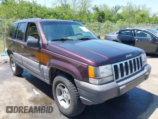 1997 Jeep Grand Cherokee TSi with VIN 1J4FX58S2VC747897, listed as a IAAI auction lot 42033868 with 119,924 mi miles. Bid and sale history available at carsss.com. Image 1.