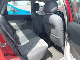 2007 Ford Focus S z VIN 1FAFP34N17W299881, wystawiony jako IAAI lot #42282442 z przebiegiem 144 782 mil mil oraz . Historia ofert i sprzedaży dostępna na DreamBid. Obrazek 8.