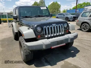 2009 Jeep Wrangler X z VIN 1J4FA24179L716499, wystawiony jako Copart lot #58342675 z przebiegiem 116 871 mil mil oraz Szkoda całkowita • Salvage title. Historia ofert i sprzedaży dostępna na DreamBid. Obrazek 11.