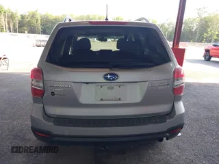 2014 Subaru Forester Premium z VIN JF2SJADC8EH541081, wystawiony jako IAAI lot #42647777 z przebiegiem 120 951 mil mil oraz . Historia ofert i sprzedaży dostępna na DreamBid. Obrazek 16.