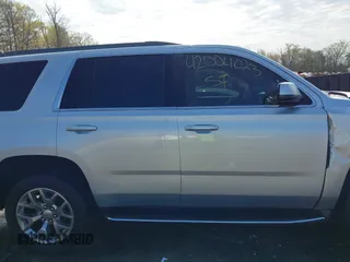 2015 GMC Yukon SLE with VIN 1GKS1AKC8FR540627, listed as a IAAI auction lot 42004023 with 128,195 mi miles. Bid and sale history available at carsss.com. Image 13.