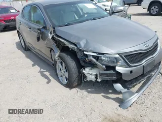 2015 Kia Optima LX z VIN 5XXGM4A76FG421945, wystawiony jako IAAI lot #42112703 z przebiegiem 106 050 mil mil oraz . Historia ofert i sprzedaży dostępna na DreamBid. Obrazek 6.