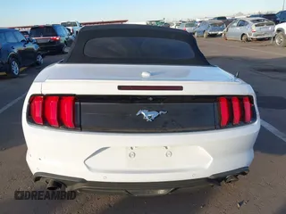 2021 Ford Mustang EcoBoost with VIN 1FATP8UH2M5120338, listed as a IAAI auction lot 40958016 with 76,979 mi miles. Bid and sale history available at carsss.com. Image 15.