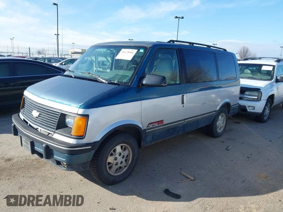 1994 Chevrolet Astro with VIN 1GNEL19W5RB123229, listed as a IAAI auction lot 41675096 with 186,497 mi miles. Bid and sale history available at carsss.com. Image 2.