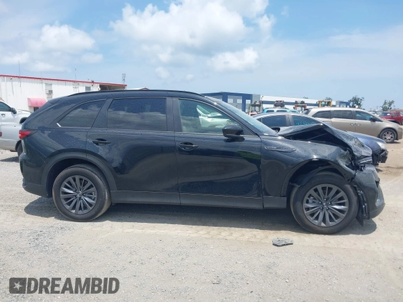 2025 Mazda CX-70 Preferred z VIN JM3KJBHD5S1117439, wystawiony jako IAAI lot #42338025 z przebiegiem 10 916 mil mil oraz . Historia ofert i sprzedaży dostępna na DreamBid. Obrazek 13.