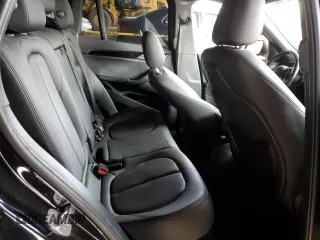 2018 BMW X1 sDrive28i with VIN WBXHU7C34J5L05725, listed as a Copart auction lot 49228475 with 69,994 mi miles and Salvage Title. Bid and sale history available at carsss.com. Image 10.